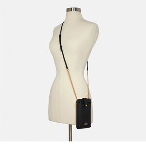 Coach phone carrying bag